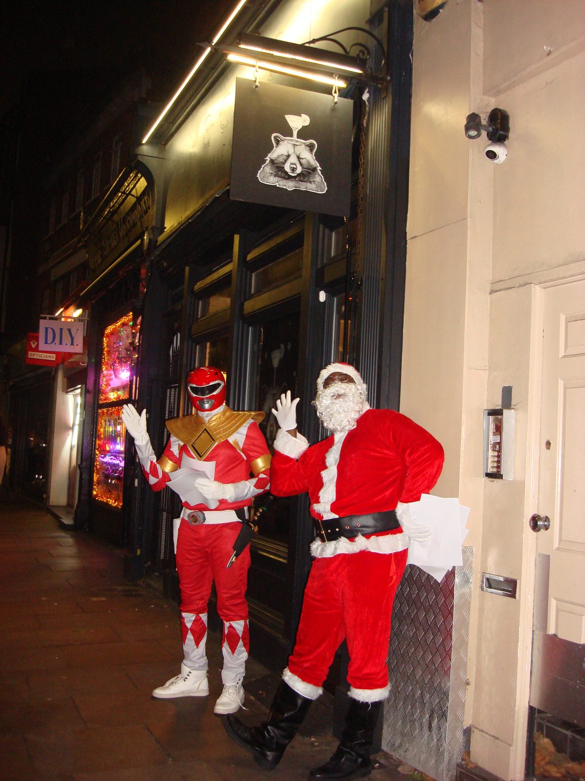 Attendees in costume outside a London venue