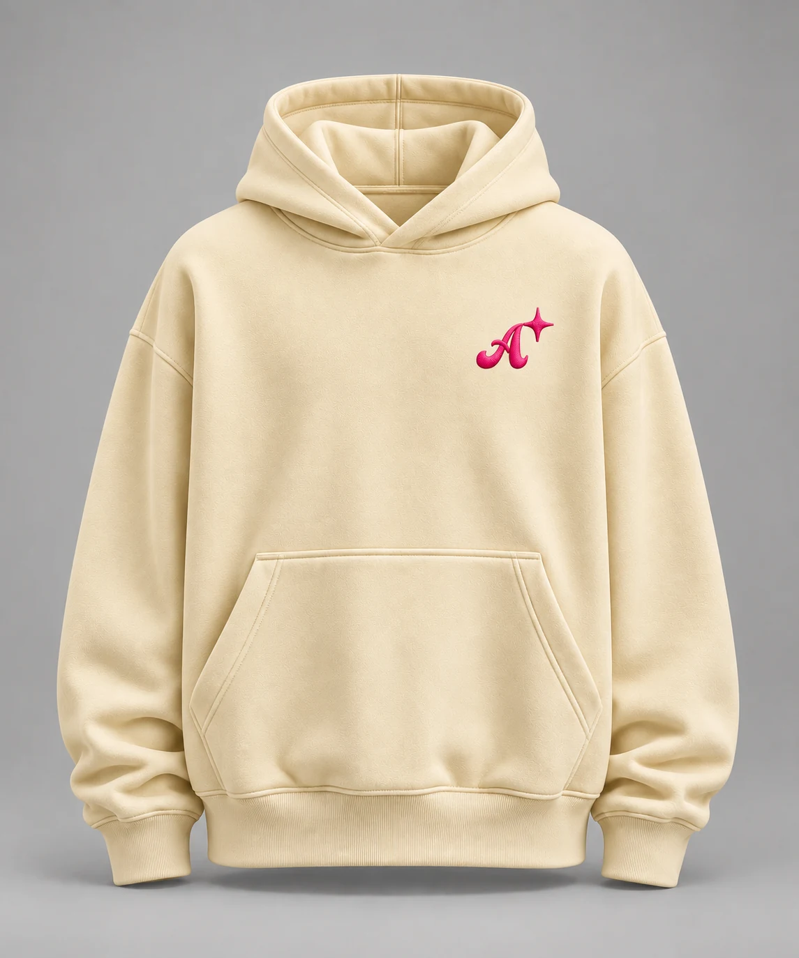 Signal Star hoodie in vanilla, front view, with the Ambifest A and four-point star embroidered in Ambifest pink on the left chest.